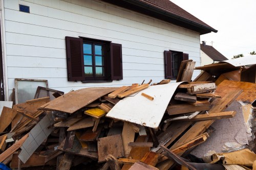 Professional waste removal team at work in a Woolwich business